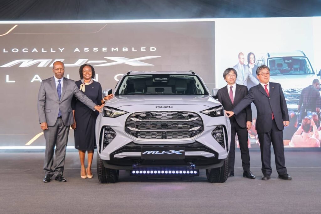 Trade CS Kinyanjui and other officials displaying the Isuzu MU-X model