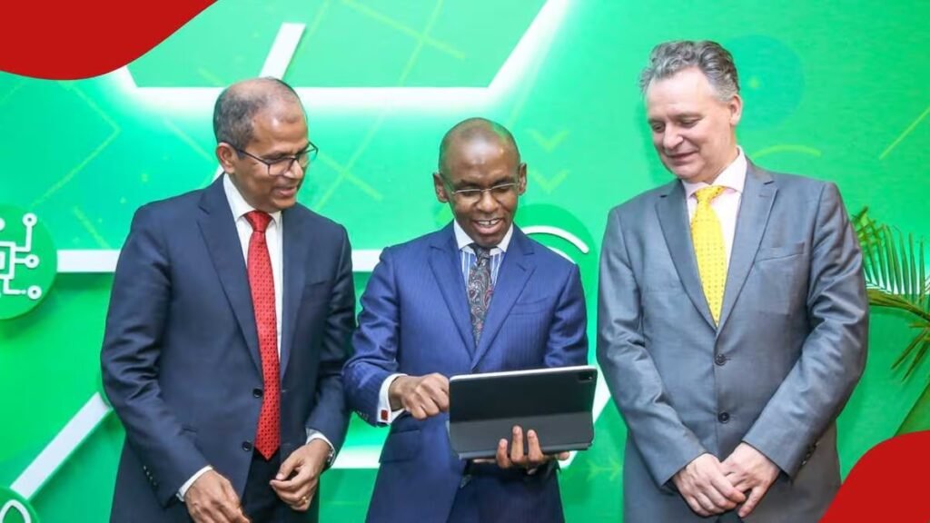 Safaricom CEO Ndegwa (Center)