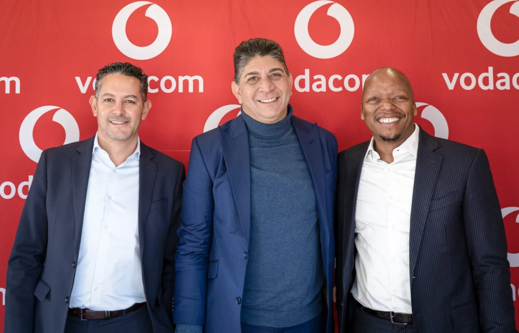 Vodacom’s CEO, Mr. Mohamed Shameel Aziz Joosub (centre)